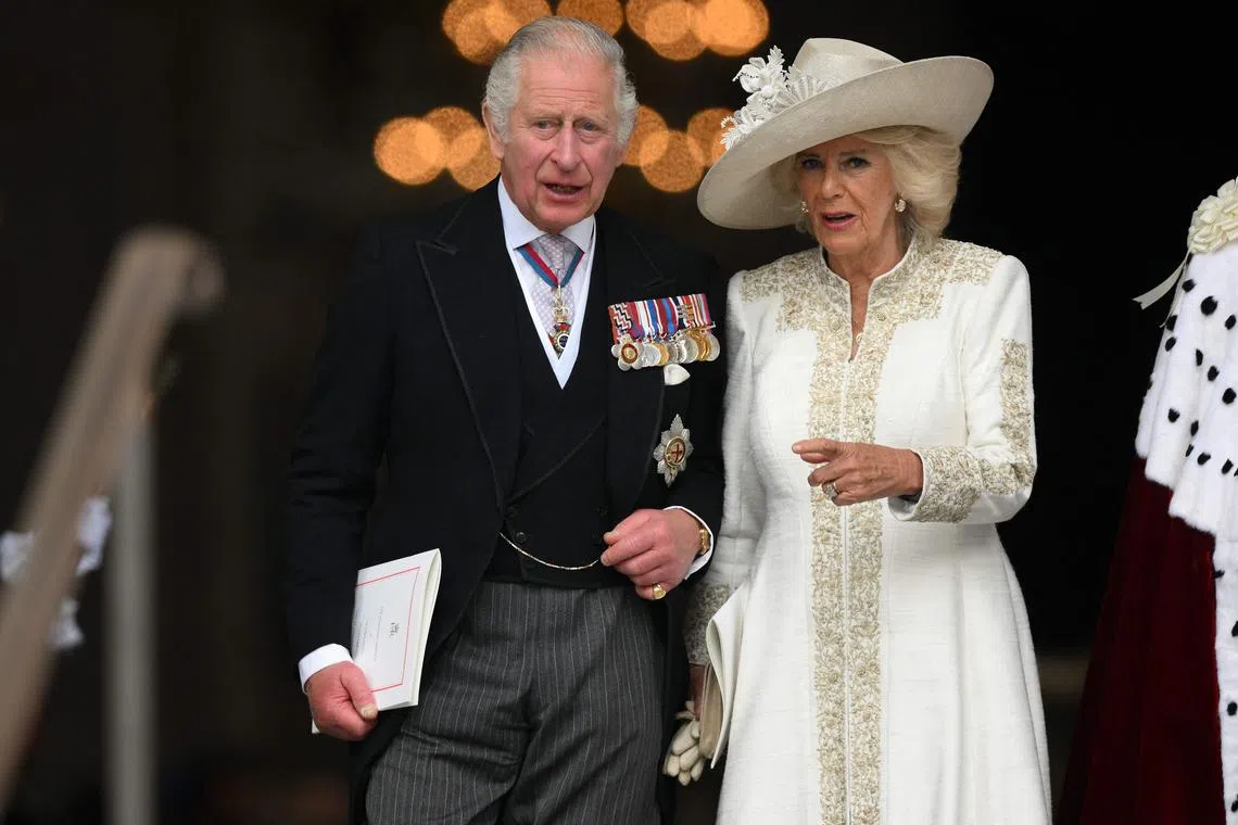 (FILES) In this file photo taken on June 3, 2022 Britain's Prince Charles, Prince of Wales (L) and Britain's Camilla, Duchess of Cornwall (R) leave after attending the National Service of Thanksgiving for The Queen's reign at Saint Paul's Cathedral in London. - Charles III arrives in France on Sunday, March 26, for his first state visit as king, but the planned celebrations of historic cross-Channel relations face potential disruption from protests over unpopular pension reforms. (Photo by Daniel LEAL / POOL / AFP)