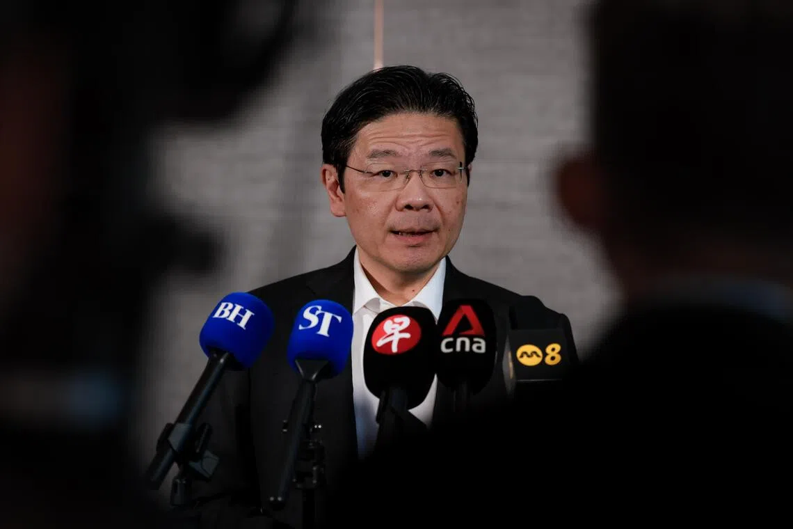 Prime Minister Lawrence Wong speaking to reporters on Oct 28.