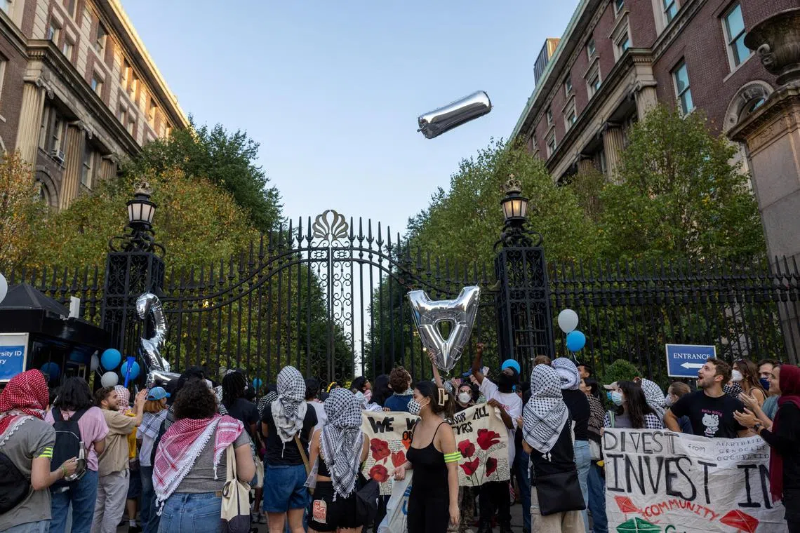Protesters gather at a main entrance in front of Columbia University during convocation in New York City, US, Aug 25, 2024.