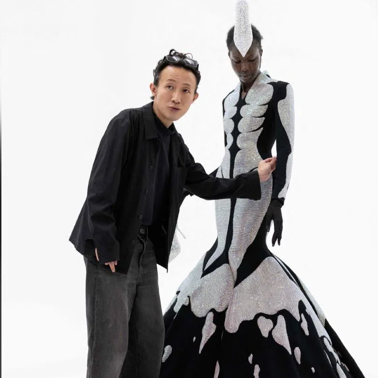 Hong-Kong born and London based Fashion designer Robert Wun in his atelier in Paris on July 7, during a fitting session on the eve of his Haute Couture Fall/Winter 2026-2027 show as part of Paris Fashion Week.