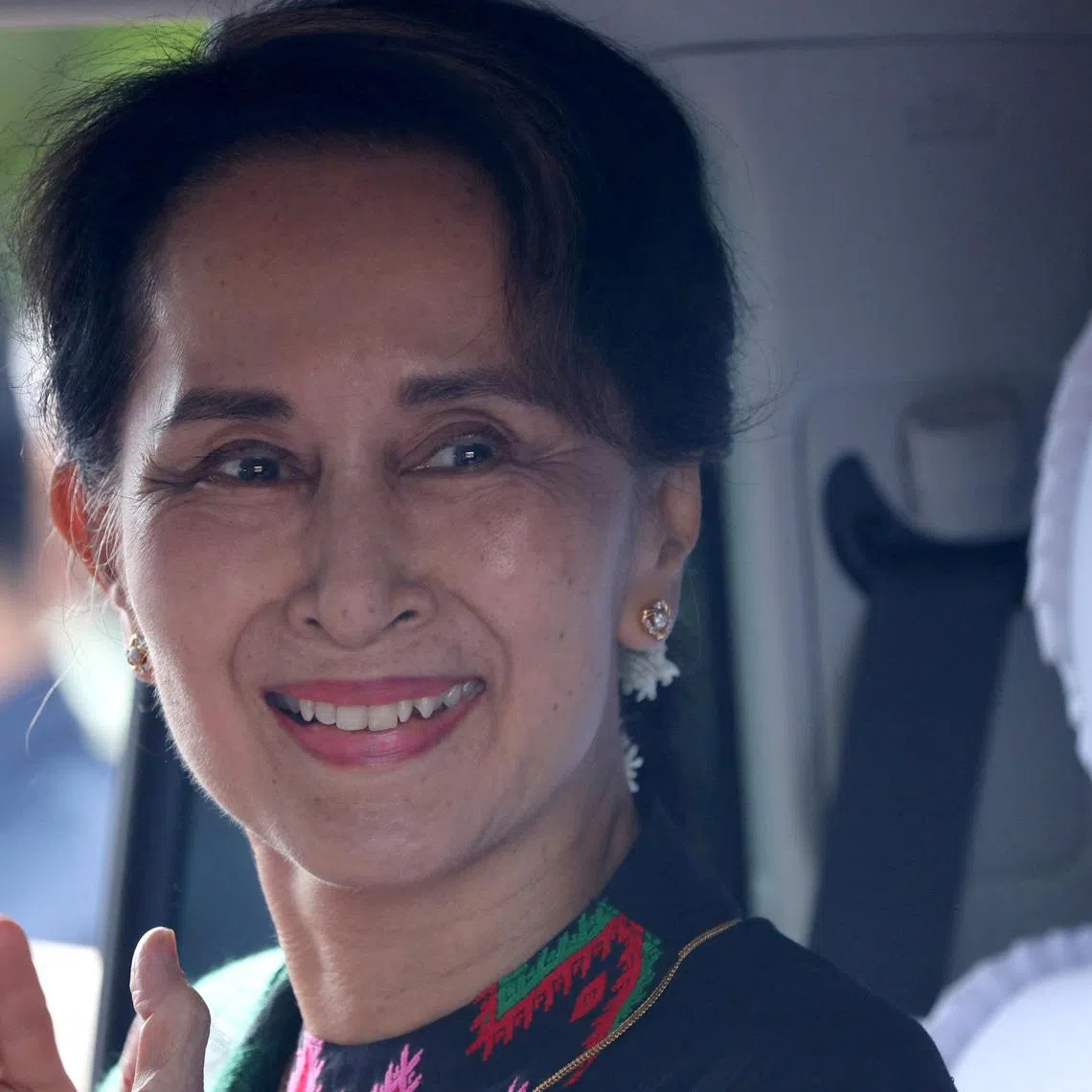 FILE PHOTO: Myanmar's State Counsellor Aung San Suu Kyi arrives at a school in Kawhmu, Yangon, Myanmar, July 18, 2019. REUTERS/Ann Wang/File Photo