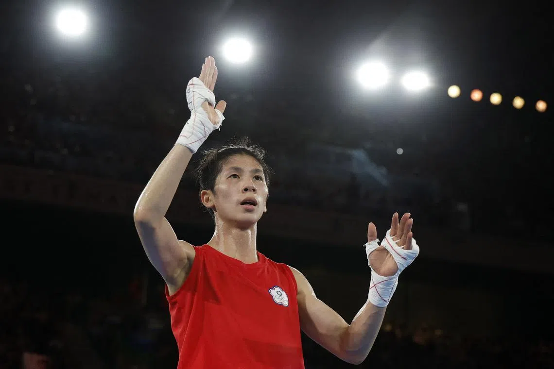 FILE PHOTO: Paris 2024 Olympics - Boxing - Women's 57kg - Final - Roland-Garros Stadium, Paris, France - August 10, 2024. Yu Ting Lin of Taiwan celebrates winning against Julia Szeremeta of Poland. REUTERS/Peter Cziborra/ File Photo