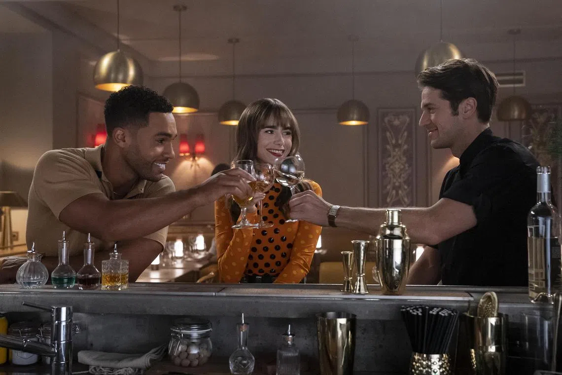 (L-R) Lucien Laviscount, Lily Collins and Lucas Bravo in Emily In Paris 3