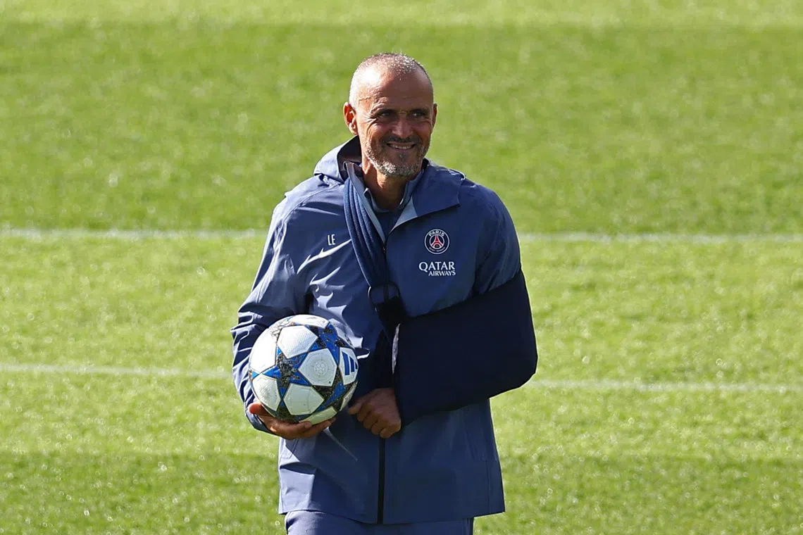 Soccer Football - UEFA Champions League - Paris St Germain Training & Press Conference - Campus Paris St Germain, Poissy, France - September 16, 2025 Paris St Germain coach Luis Enrique during the training REUTERS/Abdul Saboor