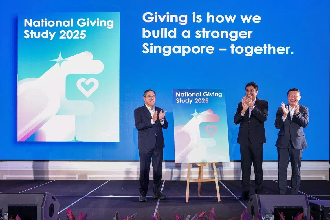 Mr Seah Chin Siong, National Volunteer and Philanthropy Centre chairman; Mr Dinesh Vasu Dash, Minister of State for Culture, Community and Youth; and Mr Tony Soh, CEO of National Volunteer and Philanthropy Centre, officiate the launch of the National Giving Study 2025 at the City of Good Forum on March 31.
