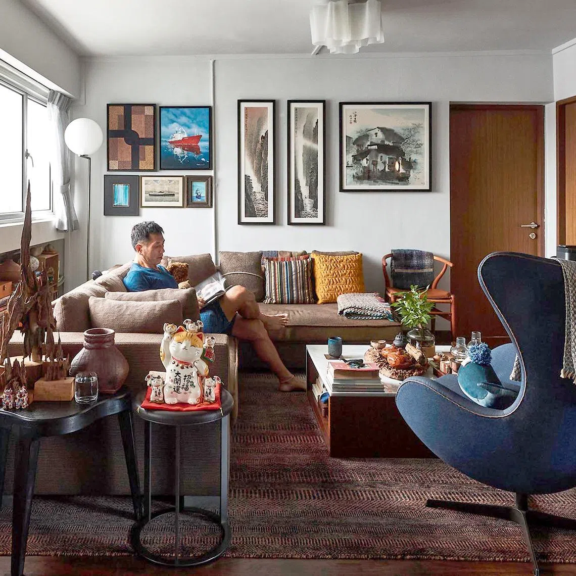 The tenth-storey Farrer Road flat is decorated with the owner's many treasured possessions.