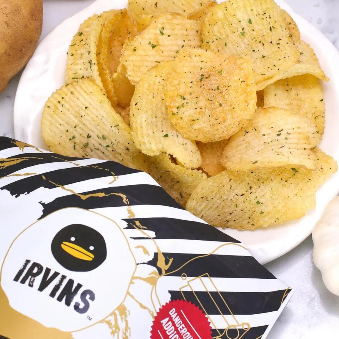SPH subscribers can enjoy 12 per cent off Irvins snacks after purchasing their new limited edition festive gift box online. 