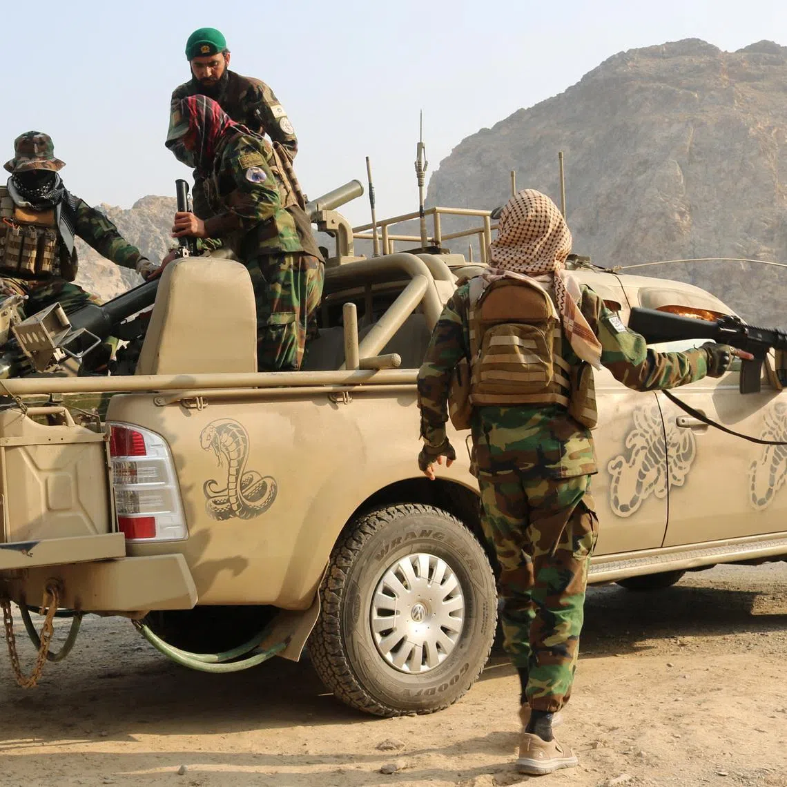 Taliban soldiers load a rocket launcher in a vehicle, following exchanges of fire between Pakistan and Afghanistan forces, near Torkham border in Afghanistan, February 27, 2026. REUTERS/Stringer