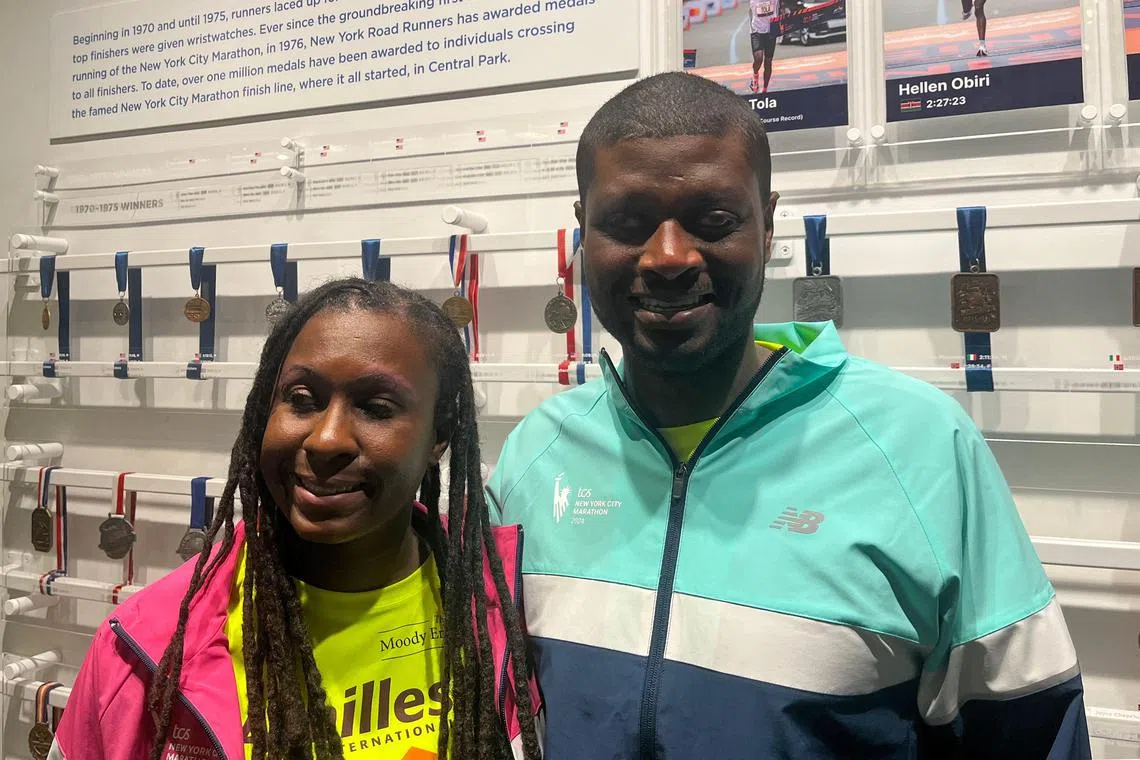 Jasmine Murrell and husband Kevin Orcel, visually impaired runners from New Jersey who will run the New York City Marathon on Nov 3.