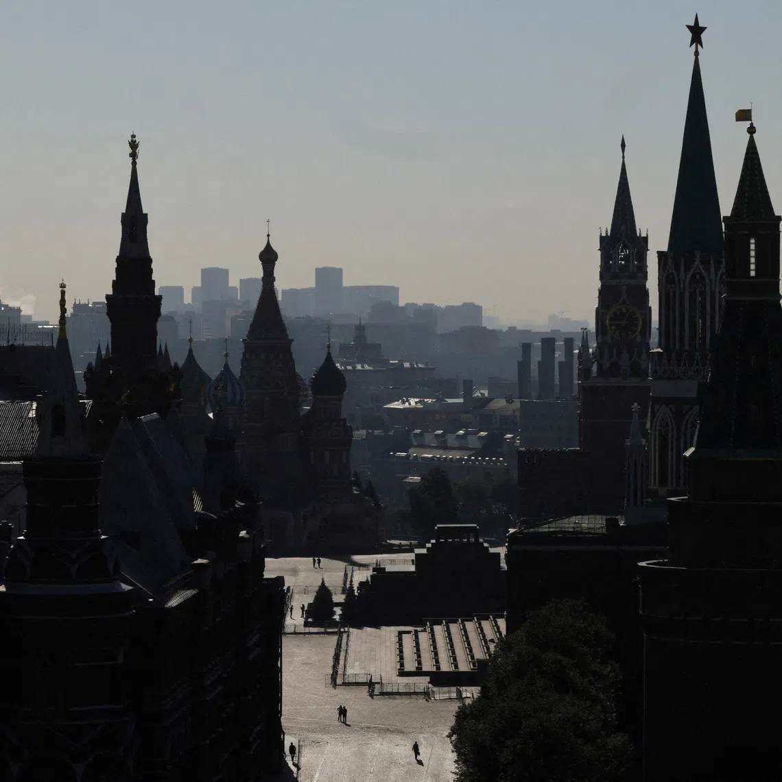 FILE PHOTO: People walk through Red Square near Kremlin towers, St. Basil's Cathedral and the State Historical Museum in Moscow, Russia, September 10, 2026. REUTERS/Anastasia Barashkova/File Photo