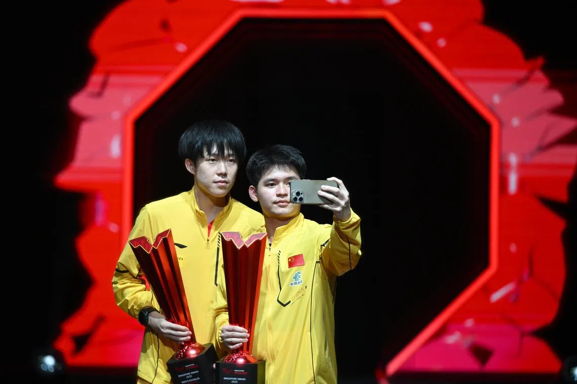Wang Chuqin (left) and Lin Shidong crowned champions of the men's doubles at the Singapore Smash.