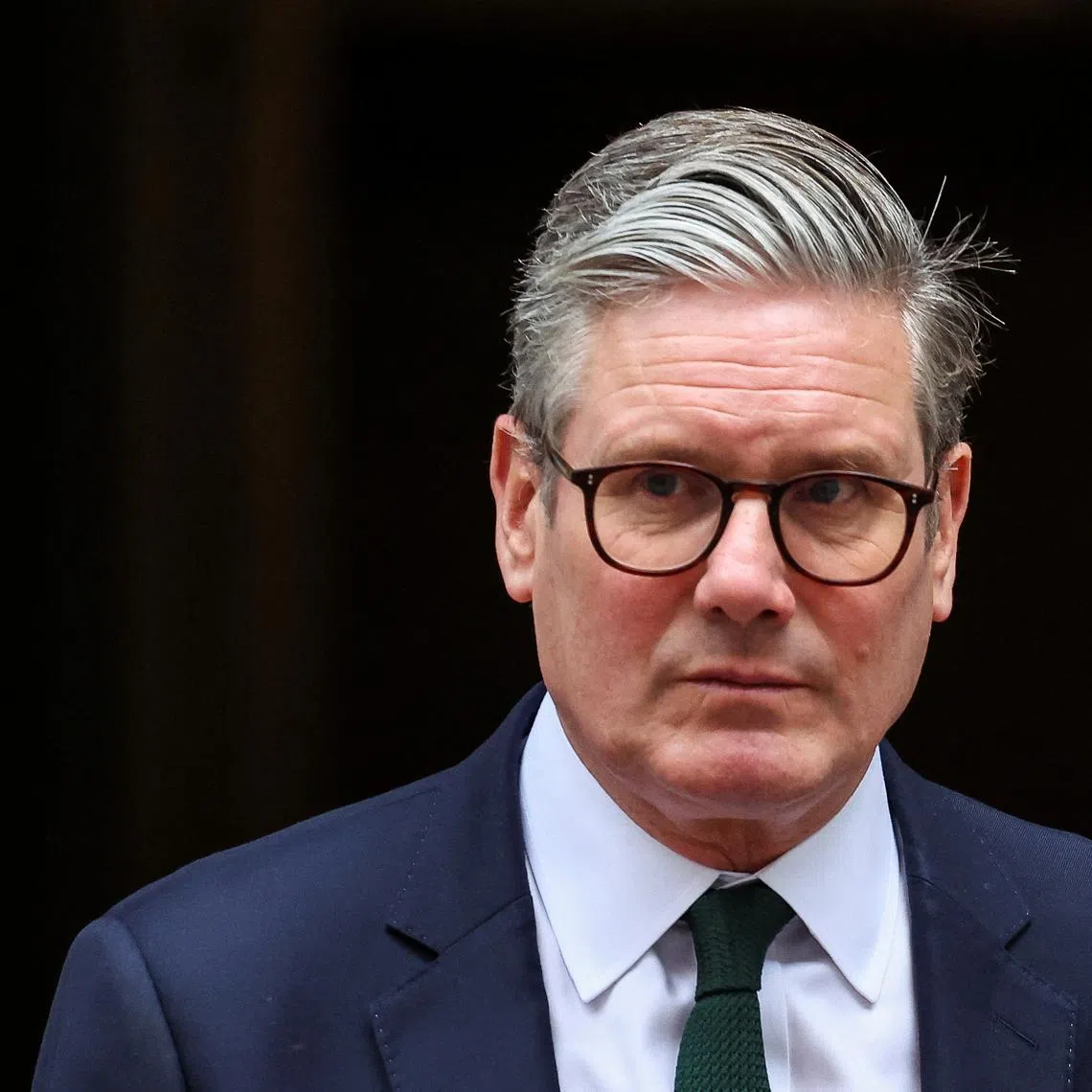 FILE PHOTO: Britain's Prime Minister Keir Starmer awaits the arrival of Oman's Sultan Haitham bin Tariq al-Said at Downing Street, in London, Britain, August 6, 2024. REUTERS/Toby Melville/File Photo