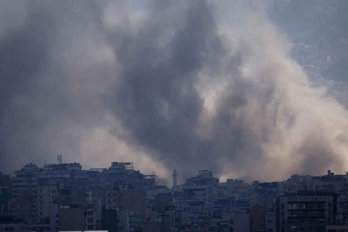 Smoke rises from Beirut southern suburbs after an Israeli strike, amid the ongoing hostilities between Hezbollah and Israeli forces, as seen from Ashrafieh, Lebanon, November 21, 2024. REUTERS/Adnan Abidi