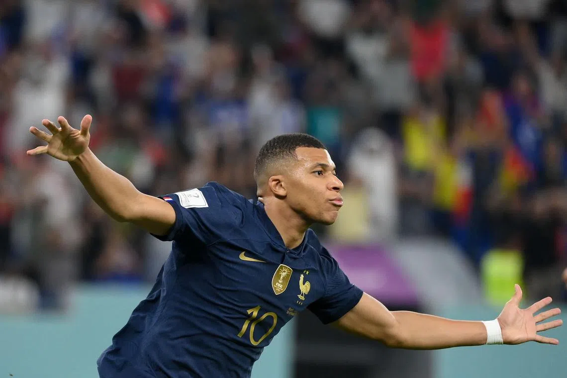France's forward #10 Kylian Mbappe celebrates after scoring his team's second goal during the Qatar 2022 World Cup Group D football match between France and Denmark at Stadium 974 in Doha on November 26, 2022. (Photo by FRANCK FIFE / AFP)