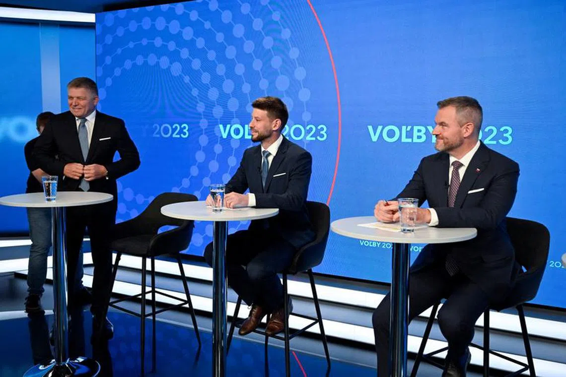 FILE PHOTO: Robert Fico, leader of the SMER-SSD party, Michal Simecka, leader of Progressive Slovakia party, and Peter Pellegrini, leader of HLAS party await for the televised debate to begin at TV TA3, prior to the Slovak early parliamentary election, in Bratislava, Slovakia, September 26, 2023. REUTERS/Radovan Stoklasa/File Photo