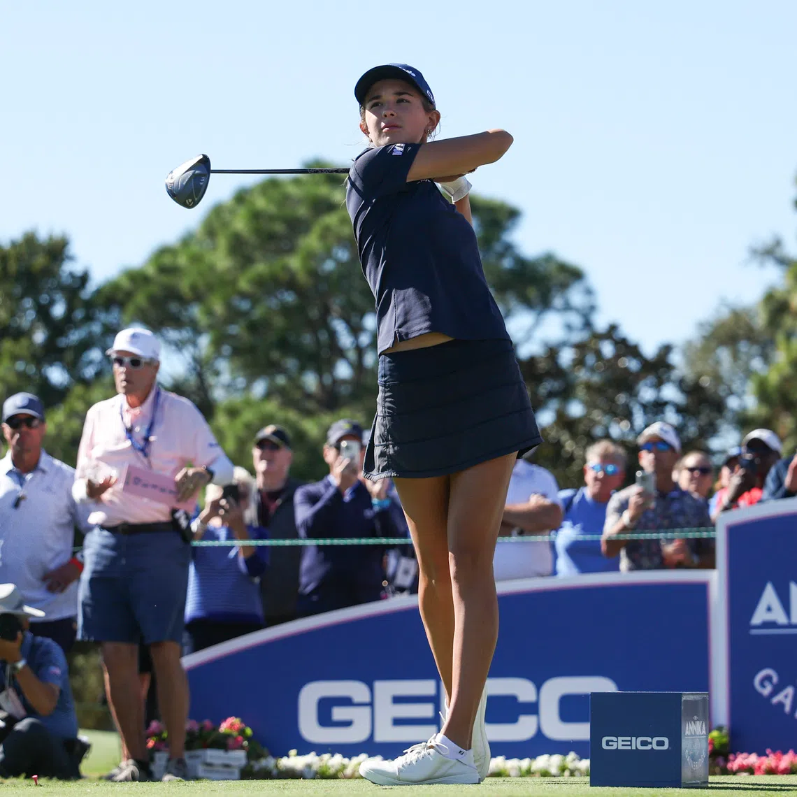 Nov 13, 2025; Belleair, Florida, USA; Kai Trump tees off on the thirteenth hole during the first round of The ANNIKA golf tournament at Pelican Golf Club. Mandatory Credit: Nathan Ray Seebeck-Imagn Images