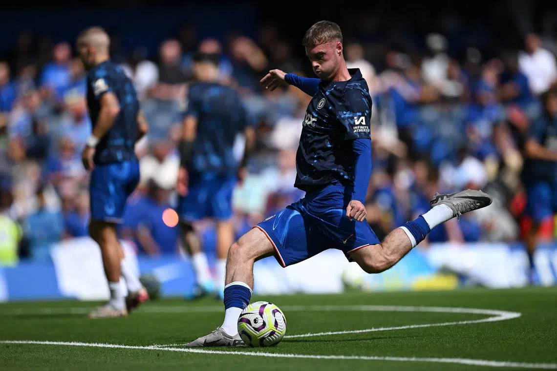 Chelsea's Cole Palmer warming up before a pre-season friendly against Inter Milan at Stamford Bridge.