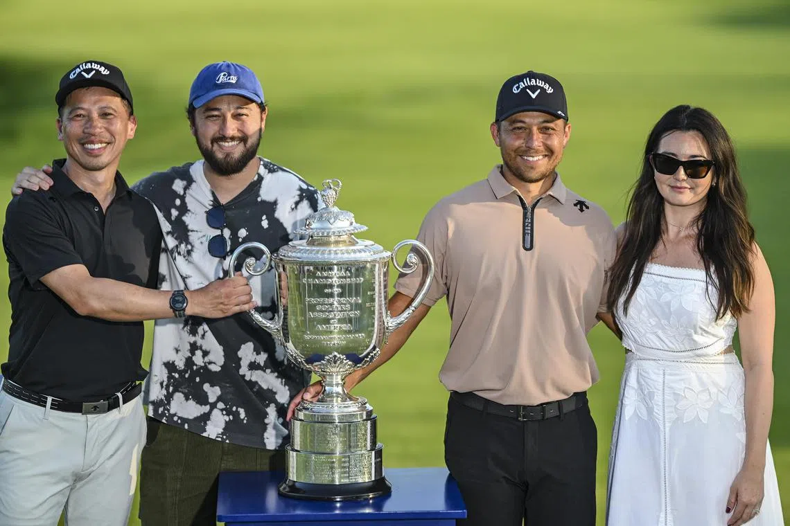 Xander Schauffele with his uncle Gao Ya Chen (extreme left), brother Nico (2nd left) and wife Maya. 

Credit/source: Getty Images
Usage: One-time use with mandatory credit.
(Note: We are authorised to use Getty Images for PGA Tour's Player's Blog column) 
load attached pic for PGA Tour player's blog to sports float: