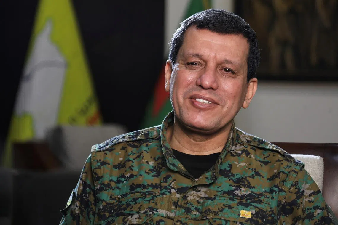 FILE PHOTO: Commander of Syrian Kurdish-led forces Mazloum Abdi, attends an interview with Reuters in Hasakah, Syria December 19, 2024. REUTERS/Orhan Qereman/File Photo