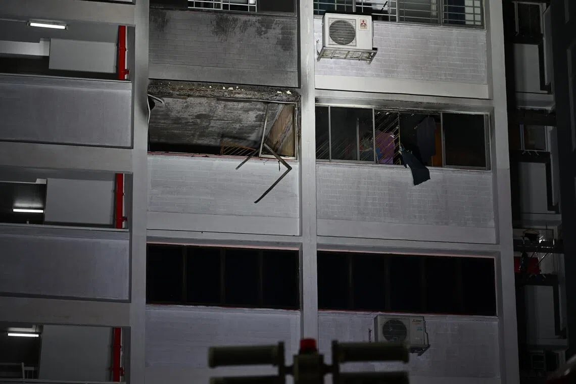Police officers had to force their entry into the locked flat in an attempt to save the occupants.