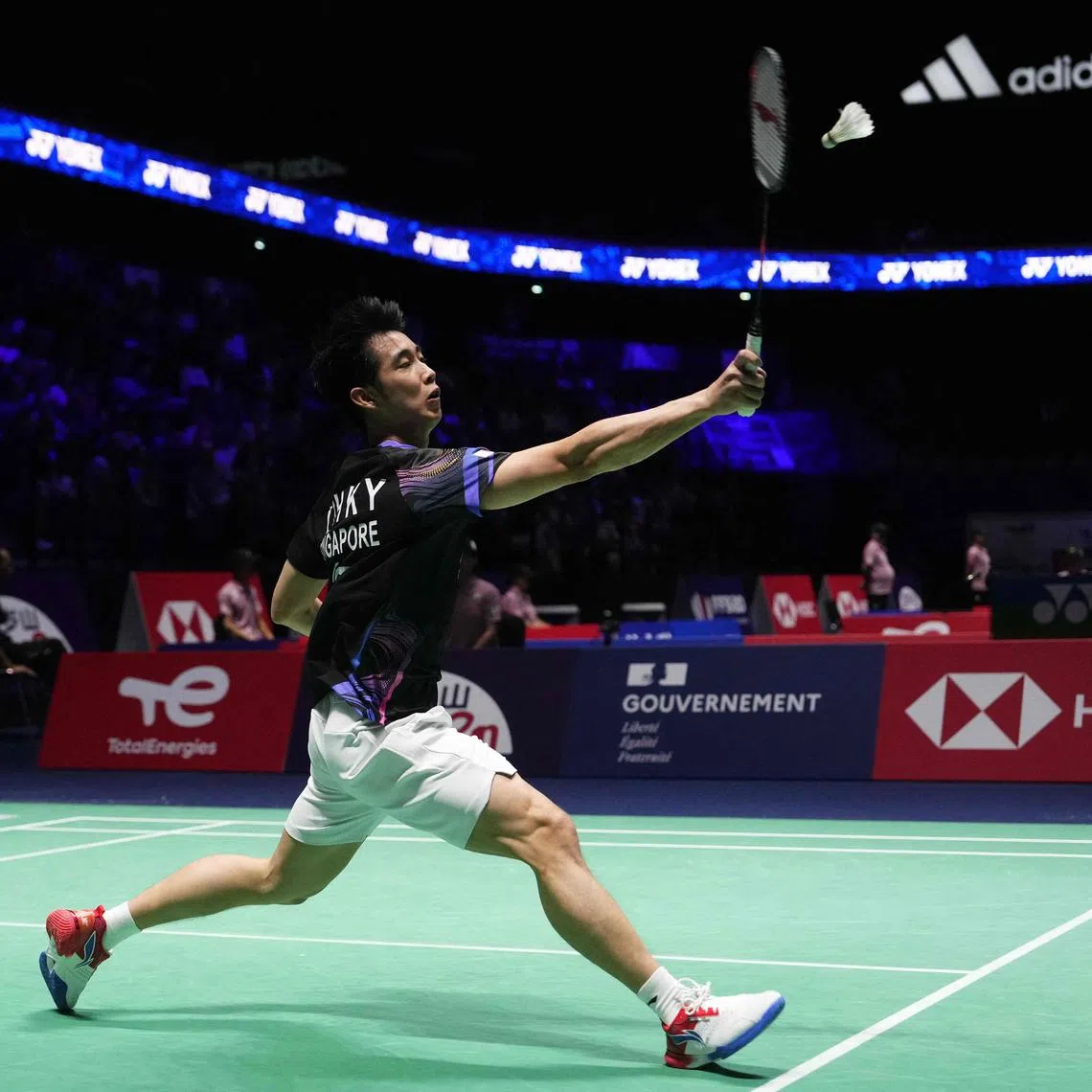 Singapore's Kean Yew Loh plays a shot to Mauritius's Georges Julien Pau in their men's singles badminton match at the Badminton BWF World Championship in Paris, on August 25, 2025.