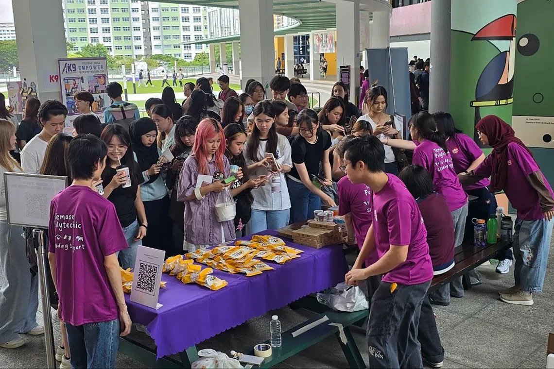 SENvocates members running a booth at the Purple Parade activation at TP in 2025. CREDIT: TP