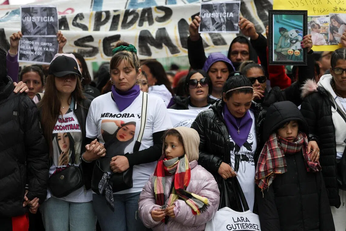 Relatives and friends of Ms Brenda del Castillo, Ms Morena Verdi and Lara Gutierrez march with abortion rights activists to mark the International Safe Abortion Day and call for justice after the three young women were tortured and murdered earlier this week in a suspected drug gang revenge attack, in Buenos Aires, Argentina, on Sept 27.