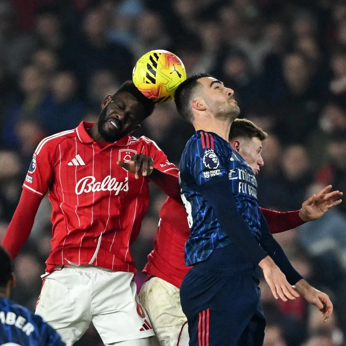 Soccer Football - Premier League - Nottingham Forest v Arsenal - The City Ground, Nottingham, Britain - January 17, 2026 Nottingham Forest's Ibrahim Sangare in action with Arsenal's Mikel Merino REUTERS/Dylan Martinez