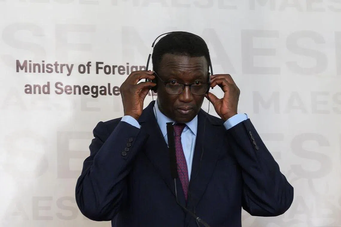 FILE PHOTO: Senegal's Foreign Minister Amadou Ba reacts during a joint news conference with U.S. Secretary of State Mike Pompeo at the Presidential Palace in Dakar, Senegal February 16, 2020. Andrew Caballero-Reynolds/Pool via REUTERS/File Photo