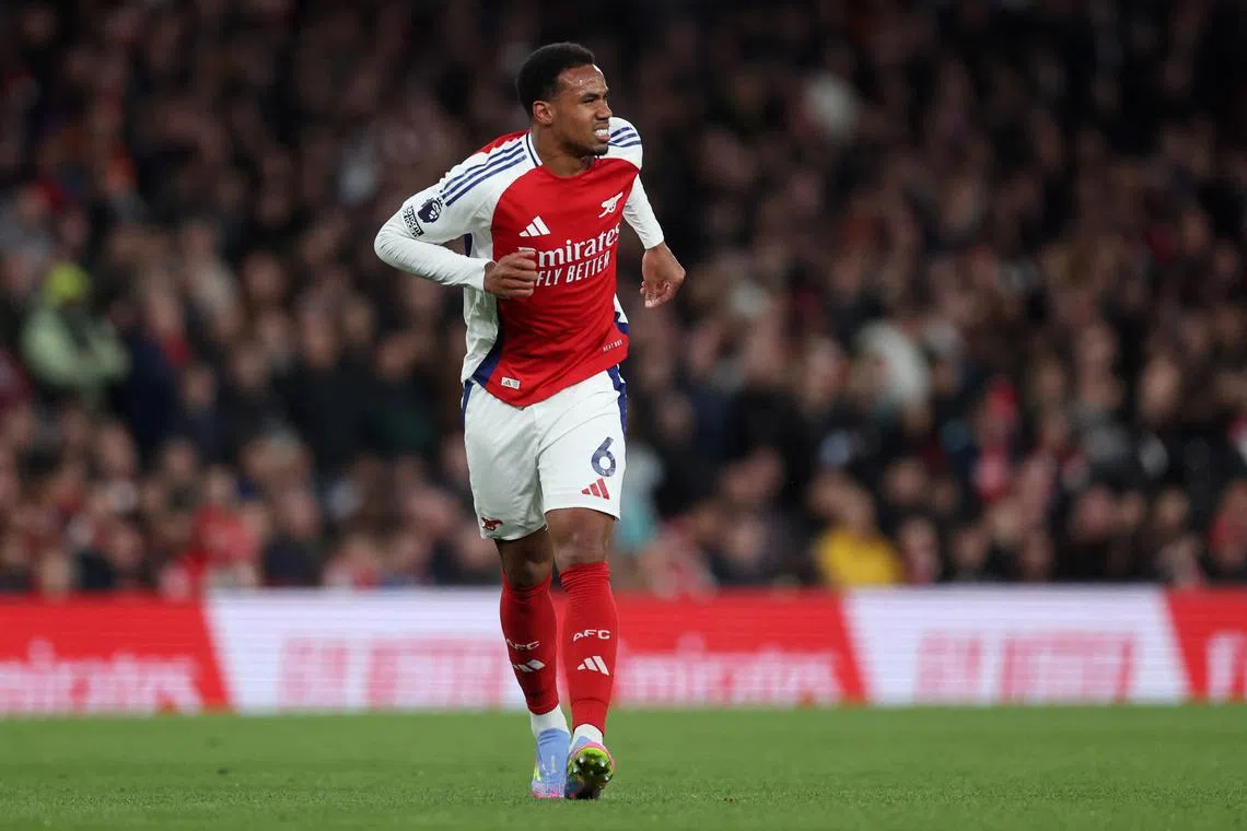 FILE PHOTO: Soccer Football - Premier League - Arsenal v Fulham - Emirates Stadium, London, Britain - April 1, 2025 Arsenal's Gabriel Magalhaes reacts after sustaining an injury REUTERS/David Klein/File Photo
