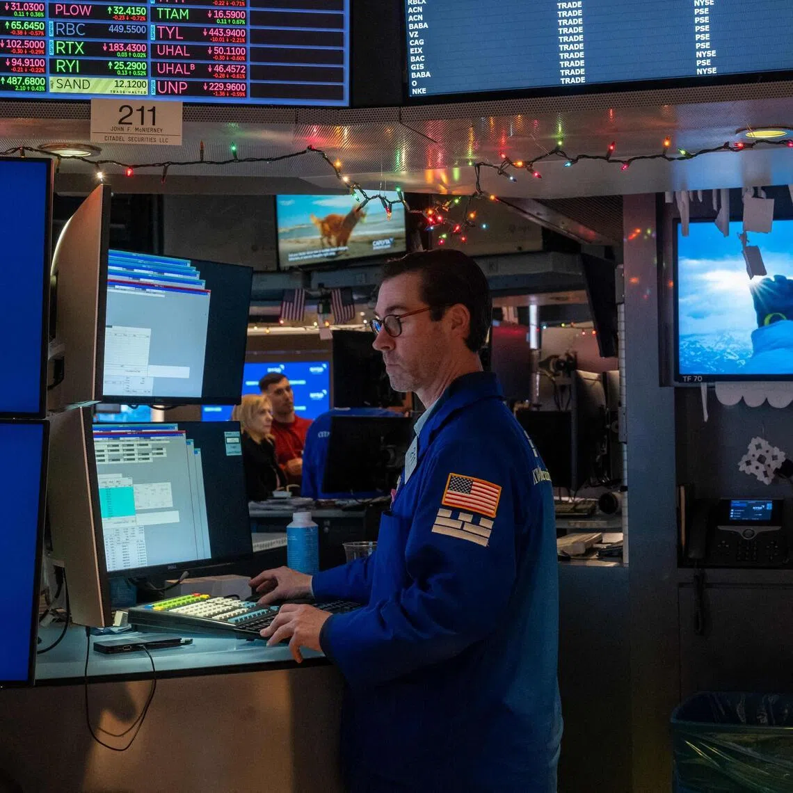 Traders working on the floor of the New York Stock Exchange, on the first day of trading for the year on Jan 02, 2026, in New York City.