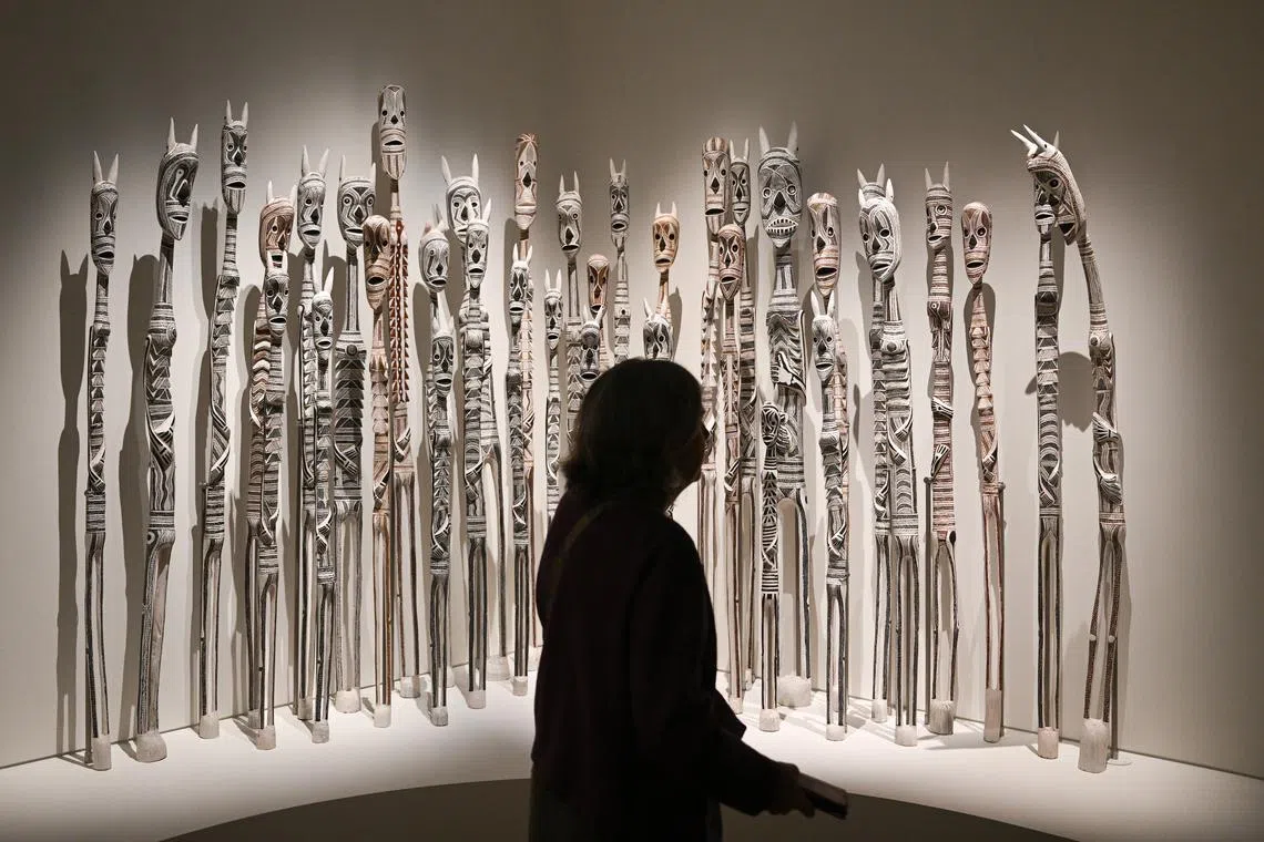 A visitor attending 'Yolngu Power: The Art of Yirrkala' winter exhibition at the Art Gallery of New South Wales in Sydney, Australia, on June 20, 2025. 