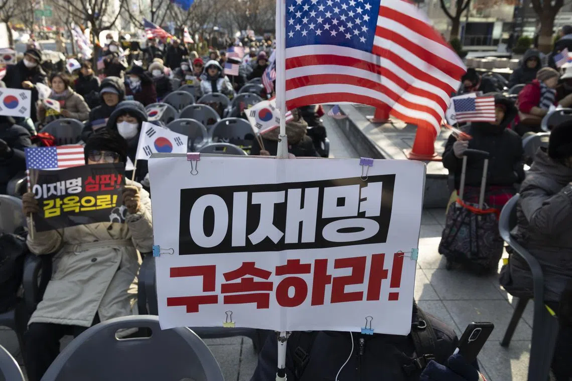 A supporter of President Yoon Suk Yeol during a rally against the oppostion in Seoul, on Dec 10.