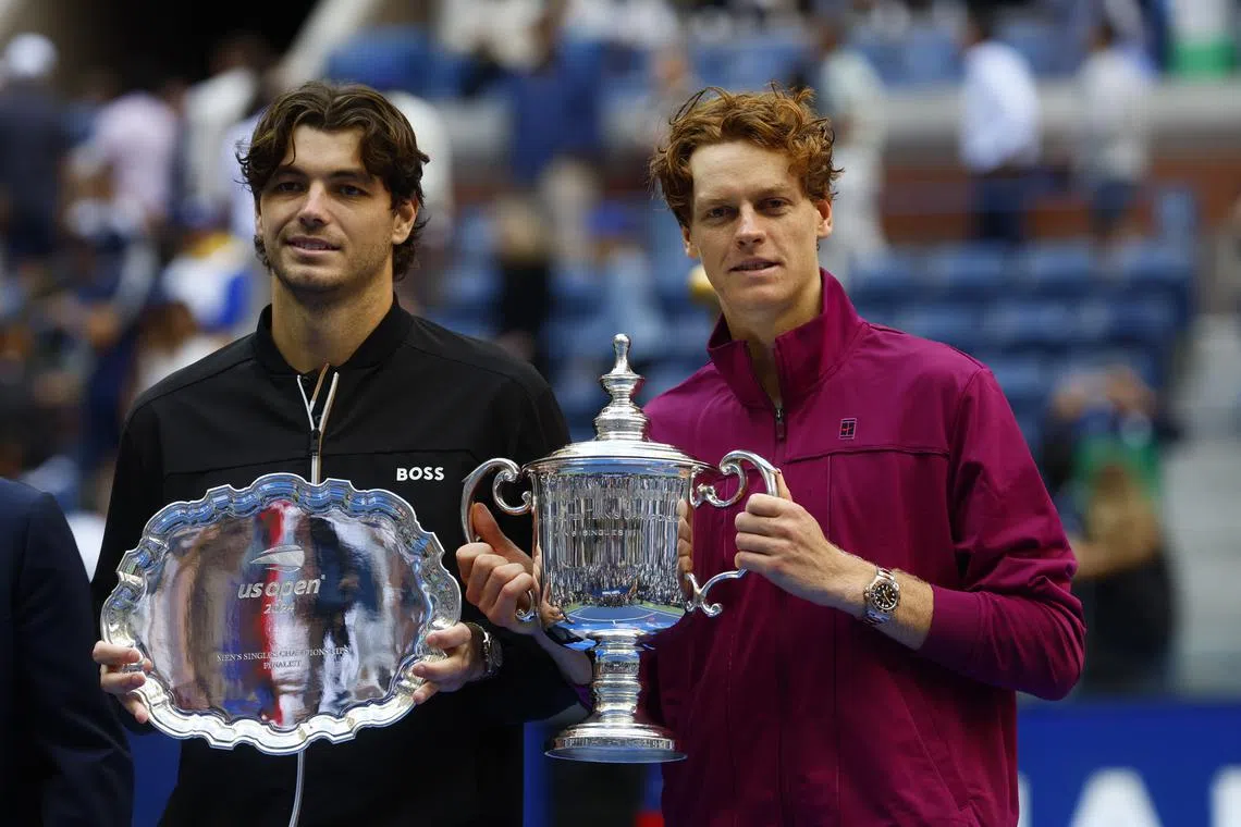 FILE PHOTO: Sep 8, 2024; Flushing, NY, USA; Jannik Sinner (ITA) and Taylor Fritz (USA) pose for a photo with their trophies after the men’s singles final of the 2024 U.S. Open tennis tournament at USTA Billie Jean King National Tennis Center. Mandatory Credit: Mike Frey-Imagn Images/File Photo