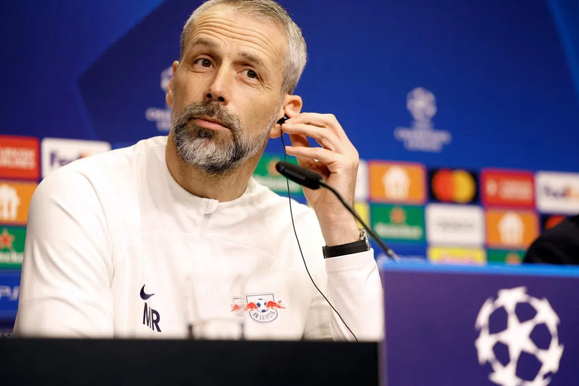 RB Leipzig's German coach Marco Rose listening to questions during a press conference on Feb 12, on the eve of their Champions League round of 16, first-leg football match against Real Madrid in Leipzig.