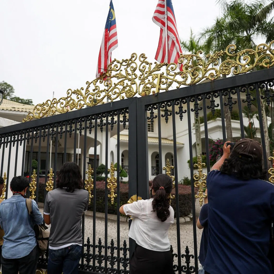 Journalists outside former Malaysian prime minister Najib Razak’s house on Sept 18, before the king agreed to allow him to serve the remainder of his six-year sentence under house arrest.