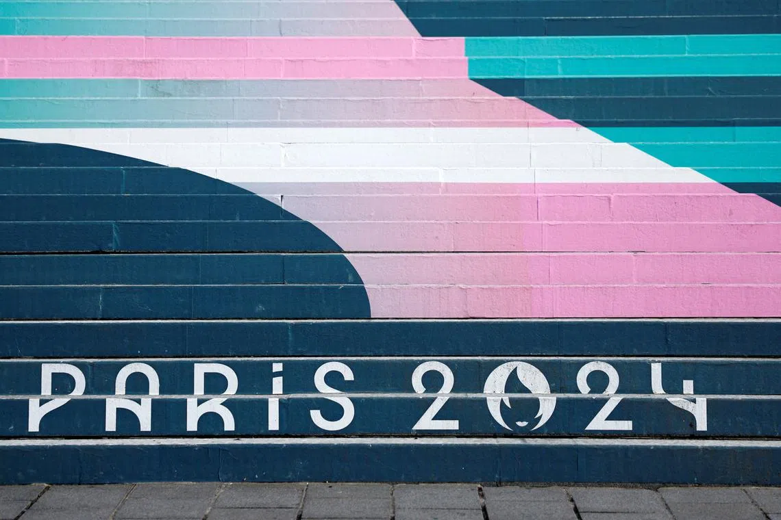 The logo of Paris 2024 is seen on the Sacre-Coeur Basilica stairs painted with the Paris 2024 Olympic and Paralympic Games design, at the Butte Montmartre in Paris, France, April 17, 2024. REUTERS/Sarah Meyssonnier/File Photo