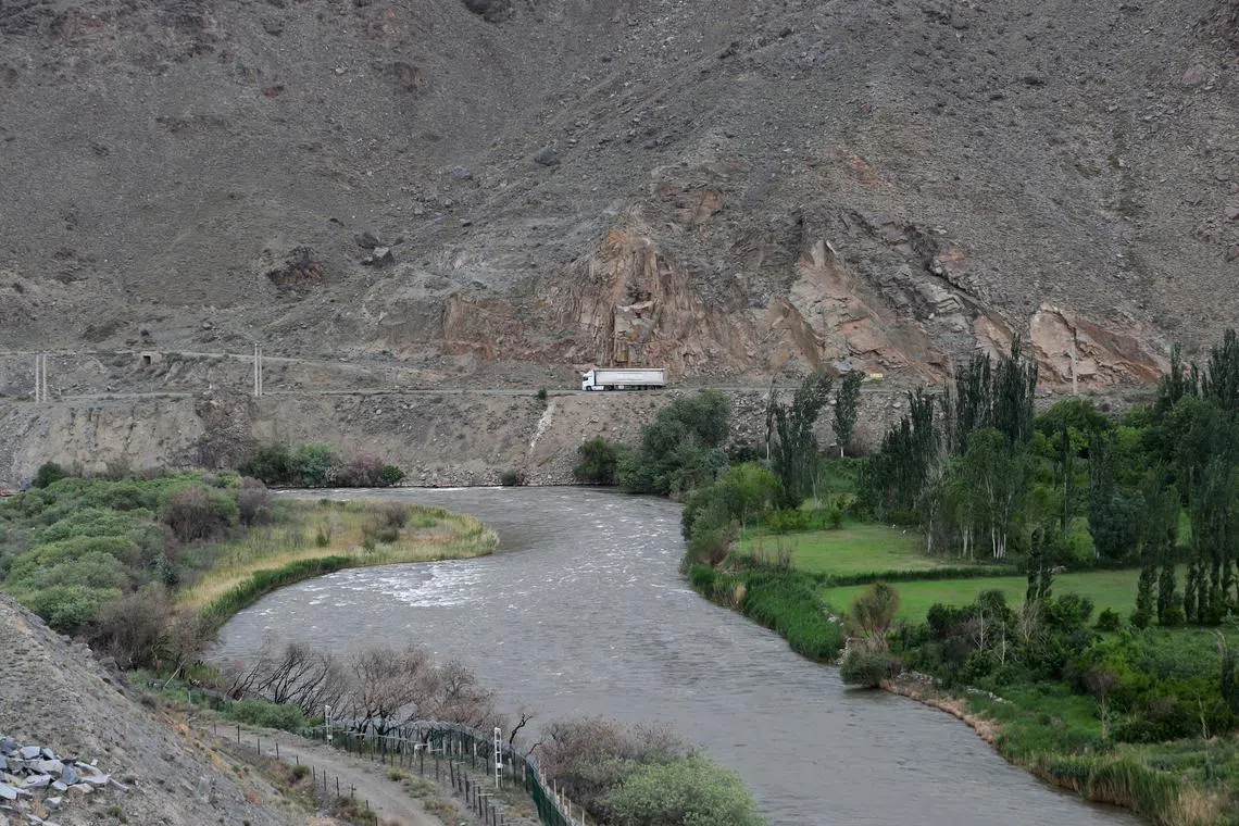 FILE PHOTO: A truck drives on a road in the border region of Iran, as seen from the Syunik Province of Armenia May 14, 2025. Hayk Baghdasaryan/Photolure via REUTERS/File Photo