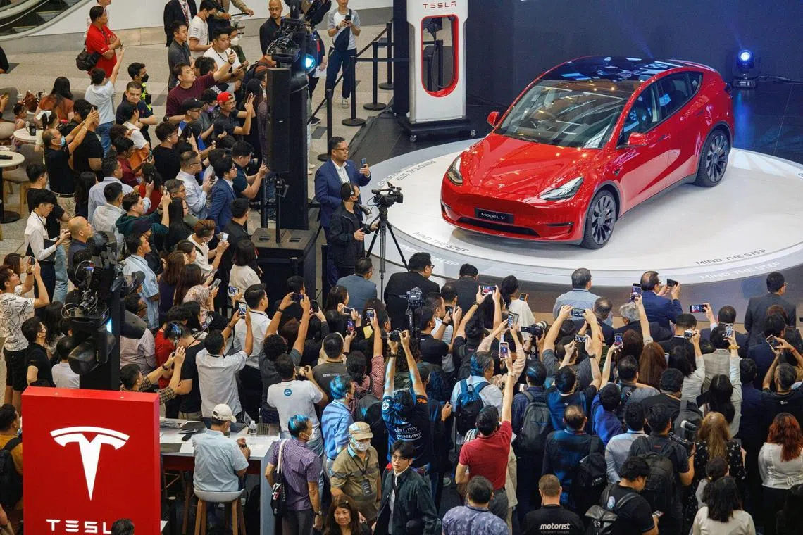 The Tesla Inc. Model Y electric vehicle during the launch in Kuala Lumpur, Malaysia, on Thursday, July 20, 2023. Malaysian Prime Minister Anwar Ibrahim said he discussed Tesla Inc.’s investments and invited SpaceX to the Southeast Asian country during a virtual meeting with Elon Musk. Photographer: Samsul Said/Bloomberg