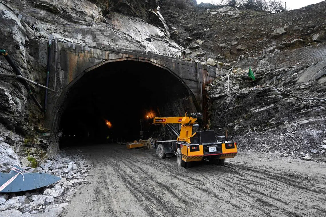 A general view of the Sela tunnel is pictured that is under construction near Sela Pass, which will lead to Tawang near the Line of Actual Control (LAC), neighbouring China, in India's Arunachal Pradesh state on October 21, 2021. (Photo by Money SHARMA / AFP)