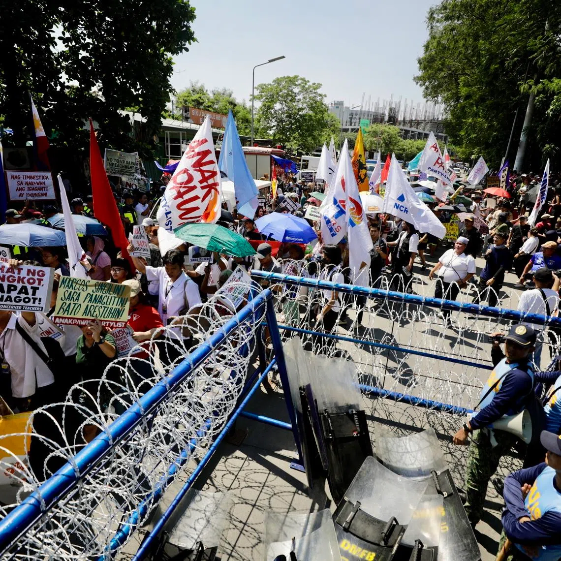 A protest rally in front of the Philippine Senate building in Pasay City, the Philippines, on July 6, on the opening day of Vice-President Sara Duterte’s impeachment trial.