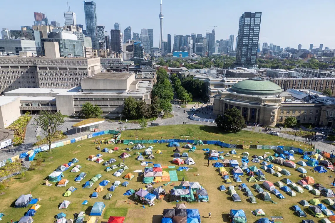 FILE PHOTO: A drone view of the pro-Palestinian encampment after a convocation ceremony at the University of Toronto in Toronto, Ontario, Canada, June 3, 2024. REUTERS/Carlos Osorio/File Photo