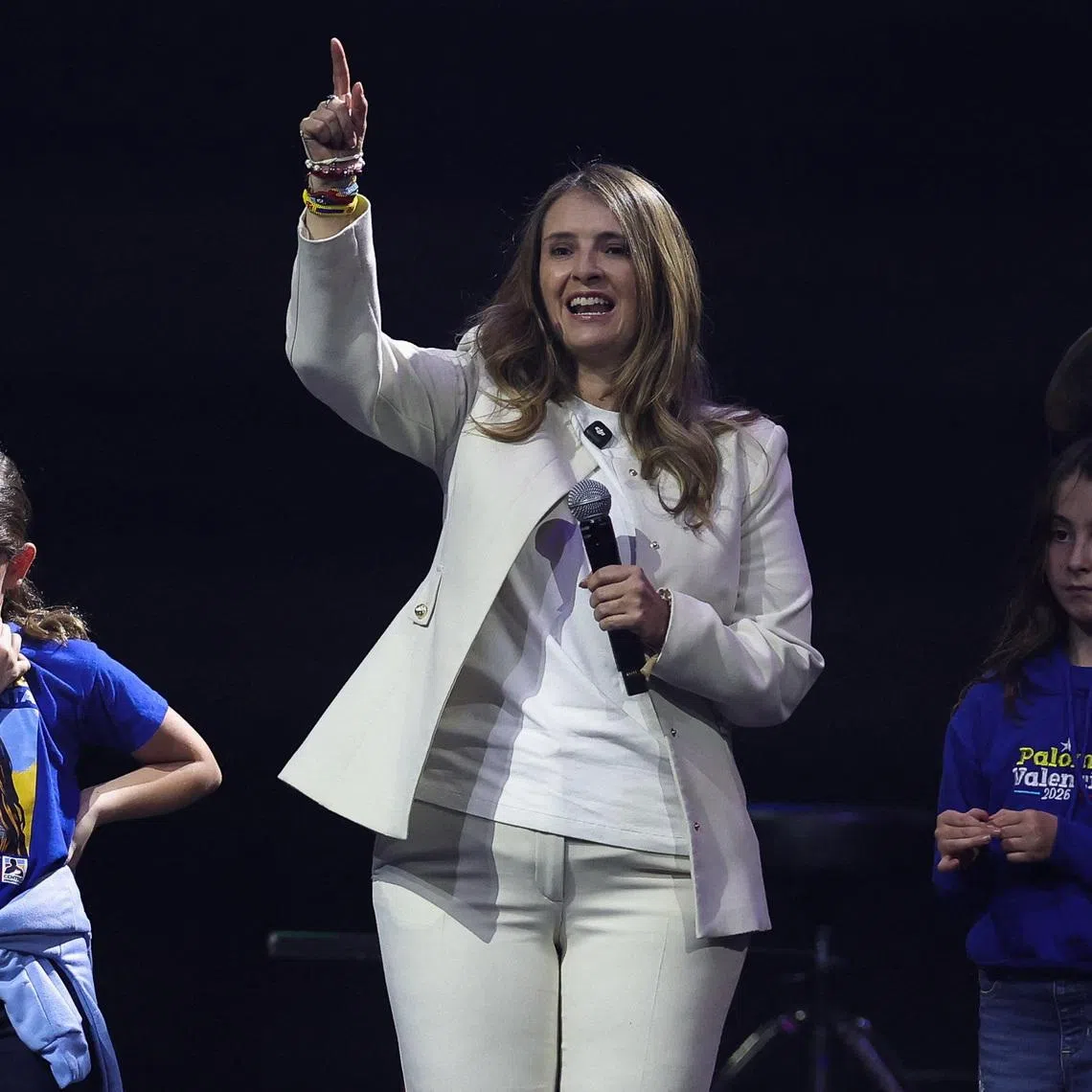 Democratic Centre party presidential candidate Paloma Valencia speaks on stage with her daughters during her campaign closing event in Bogota, Colombia, May 24, 2026. REUTERS/Luisa Gonzalez