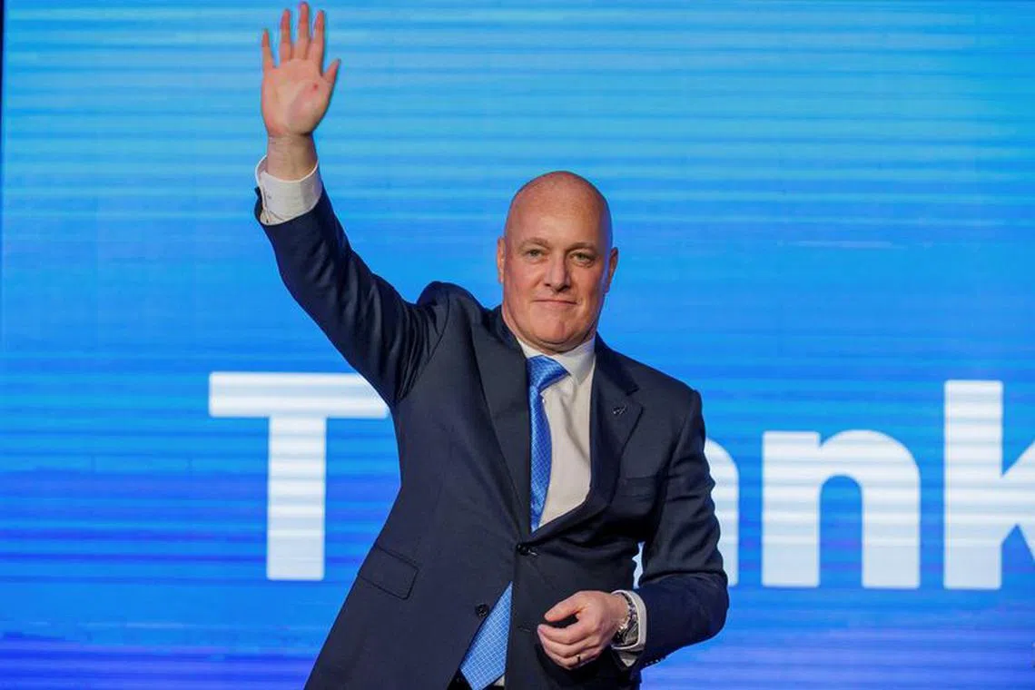 FILE PHOTO: Christopher Luxon, Leader of the National Party waves to supporters at his election party after winning the general election to become New Zealand’s next prime minister in Auckland, New Zealand, October 14, 2023. REUTERS/David Rowland/File Photo