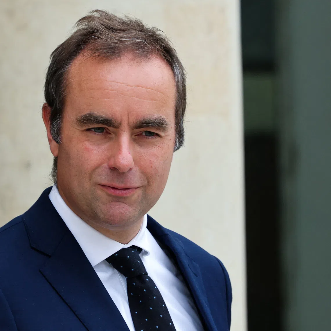 FILE PHOTO: French Defence Minister Sebastien Lecornu leaves following the weekly cabinet meeting at the Elysee Palace in Paris, France, September 3, 2025. REUTERS/Gonzalo Fuentes/File Photo