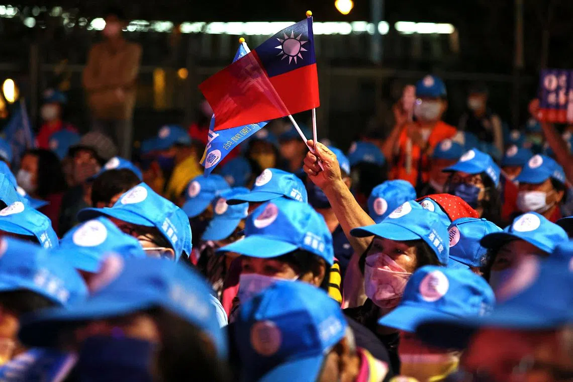 A Taiwan flag can be seen at opposition party Kuomintang party's rally ahead of the election in Taoyuan, Taiwan, November 19, 2022. REUTERS/Ann Wang
