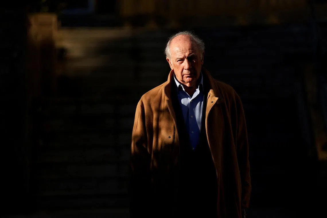 FILE PHOTO: Former International Monetary Fund chief Rodrigo Rato, found guilty of embezzlement in 2018, leaves court after facing the first day of a new trial on charges of corruption, money laundering and tax dodging, with the prosecutor requesting a sentence of over 60 years in prison in Madrid, Spain, December 15, 2023. REUTERS/Susana Vera/File Photo
