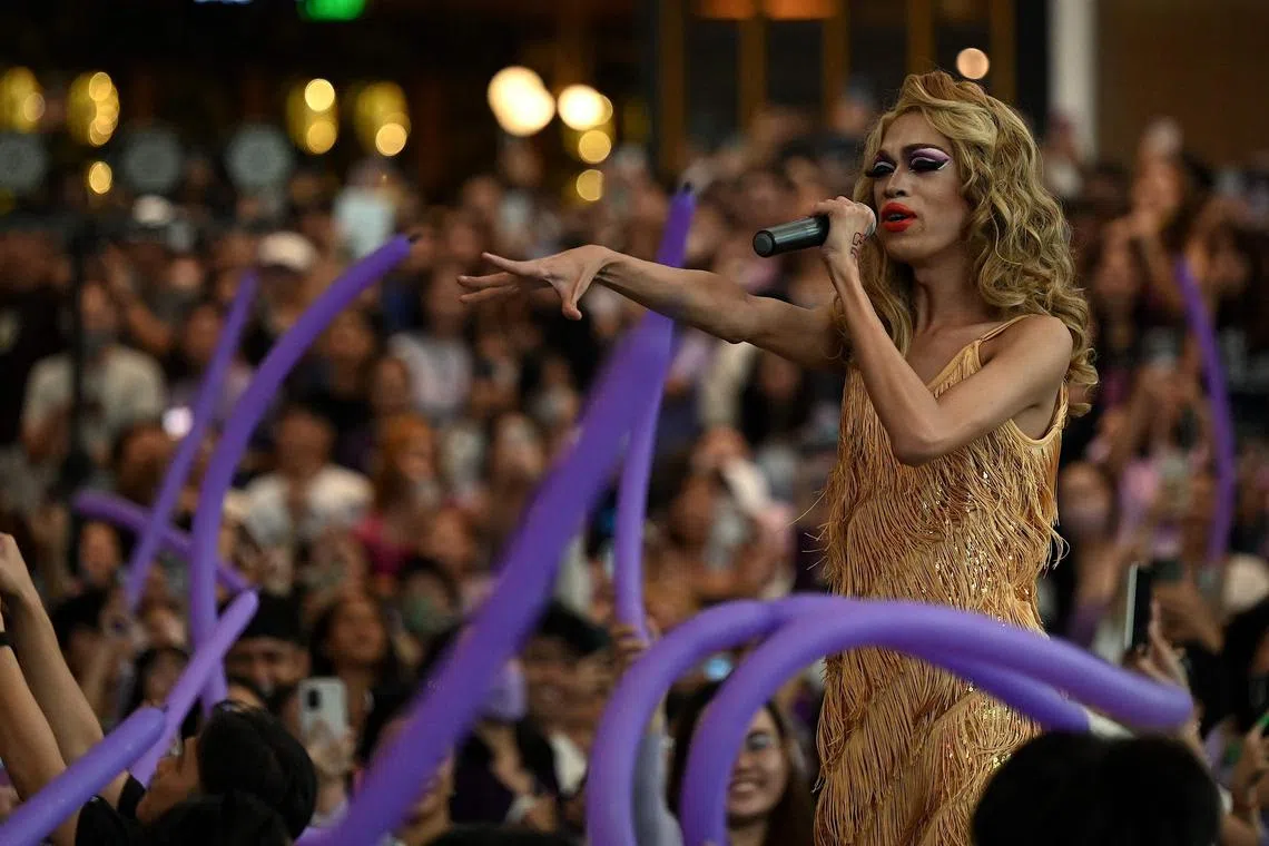 Taylor Sheesh, a Philippine drag queen impersonating Taylor Swift, performs in a fan event in Manila on July 7, 2023. Thousands of diehard Taylor Swift fans erupted with screams as Philippine drag queen impersonating the American music megastar burst onto stage in a Manila shopping mall. 