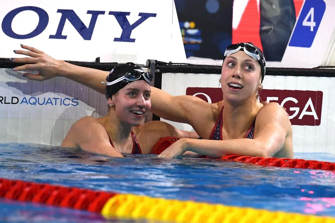US Gretchen Walsh (R) reacts after winning the Women’s Individual 100m Medley final during the World Aquatics Swimming Championships (25 m) 2024 at Duna Arena in Budapest, on December 13, 2024. (Photo by Ferenc ISZA / AFP)