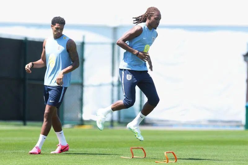 Djed Spence during training on June 20, 2026, with Jarel Quansah looking on in Kansas City. 